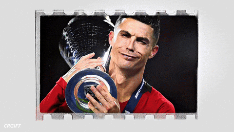 Cristiano Ronaldo holding a trophy