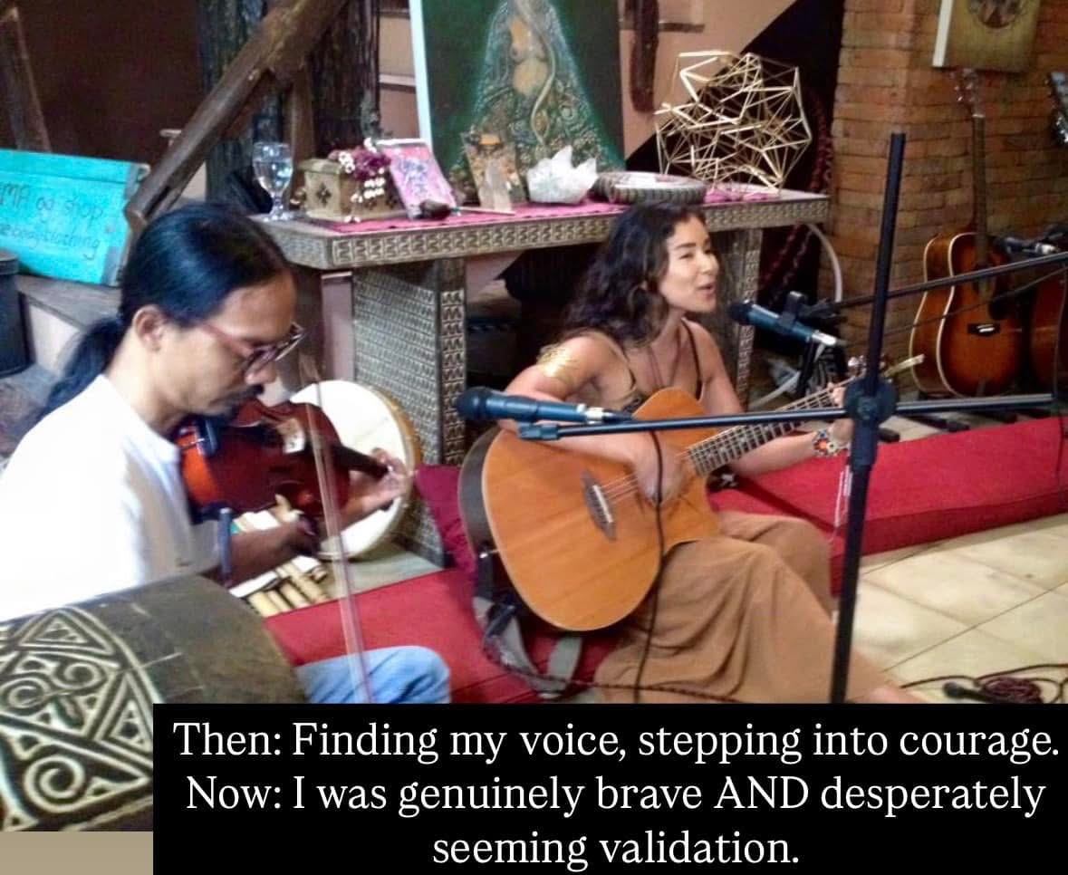 Aimi performing music with guitar and violin at an open mic